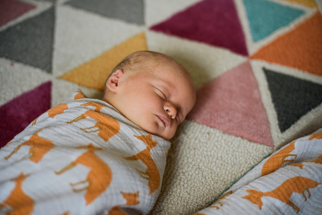 Sleeping baby during a lifestyle newborn session in Roanoke City, Virginia