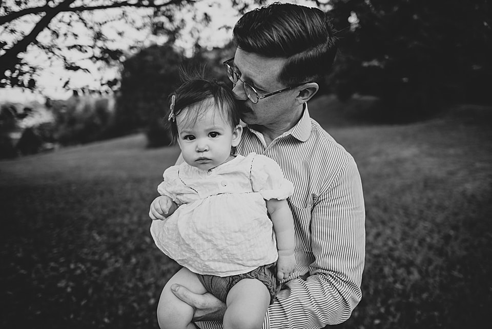Black-and-white father-daughter portrait by lifestyle photographer Laura Richards